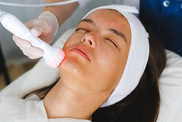 Doctor doing anti aging procedure for patient